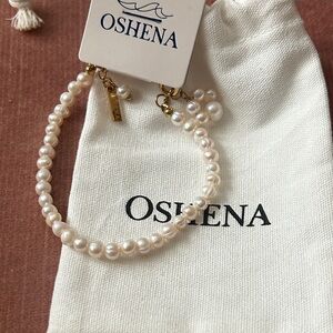 Oshena Beachwear freshwater Calla Pearl Bracelet with cat paw charm